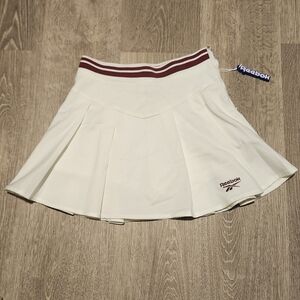 reebok white tennis skirt with built in shorts limited edition. Never worn!